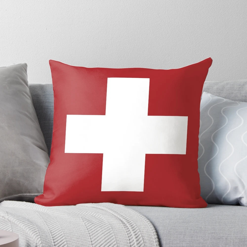 Minimalist Swiss cross red and white pillow, a timeless Scandinavian design icon