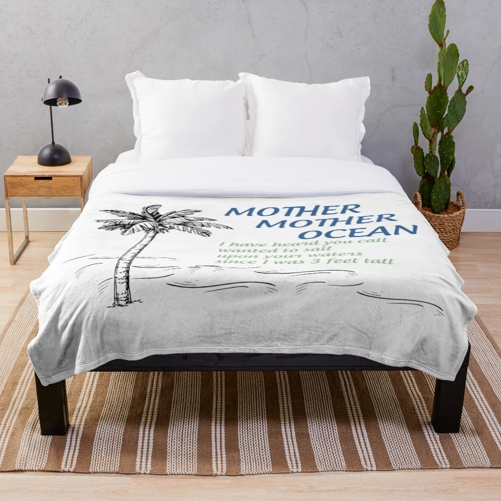 Plush blanket featuring tropical ocean and parrothead design