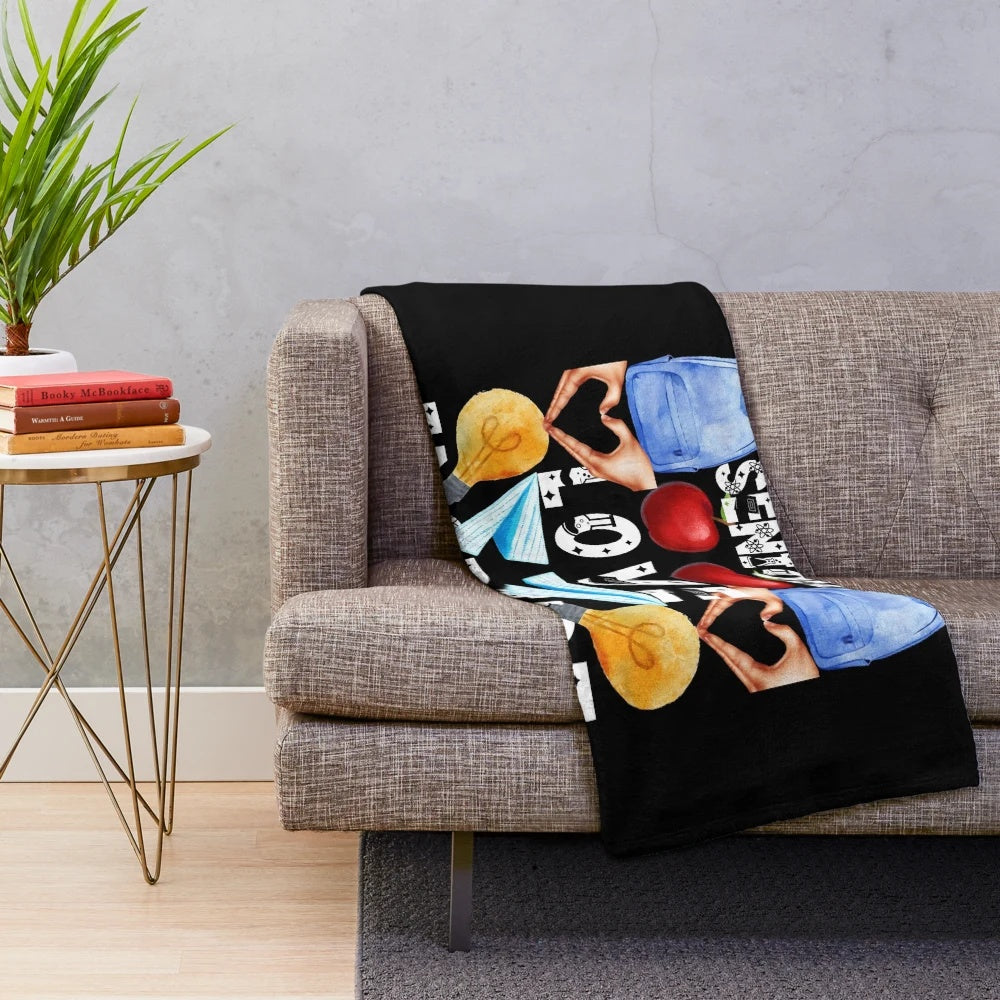 Inspirational plush blanket with the text "teach love inspire" for teachers and seniors