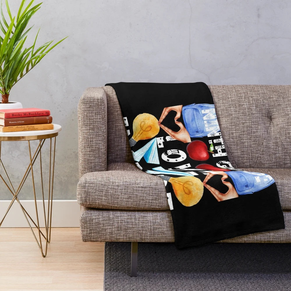 Plush blanket with the text "teach, love, inspire" for ninth grade teachers
