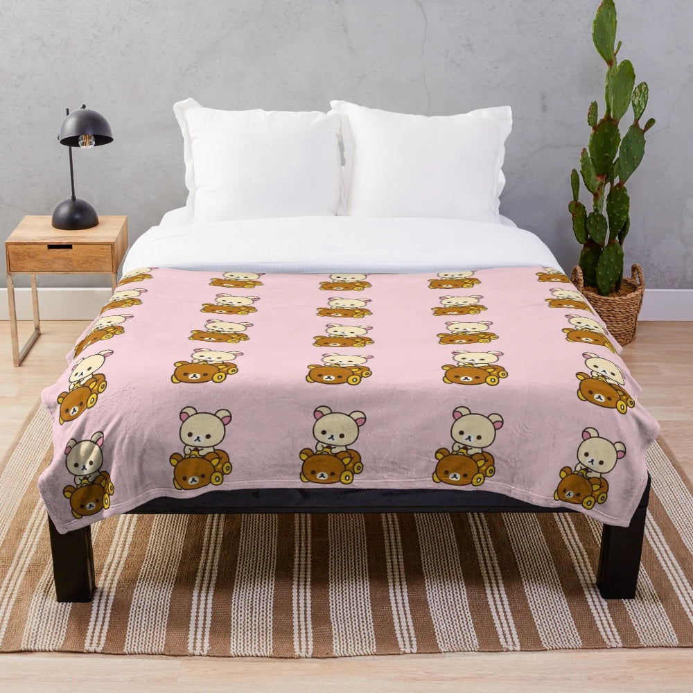 Cute plush blanket featuring Rilakkuma and Korilakkuma in a car design