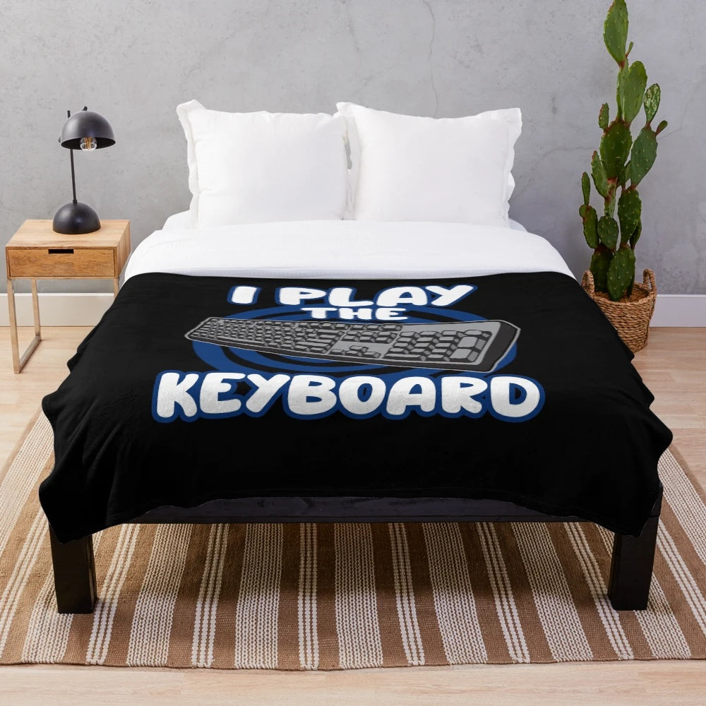 Cozy keyboard-themed plush blanket for gaming and computer enthusiasts