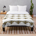 Colorful abstract plush blanket featuring a legendary bee design