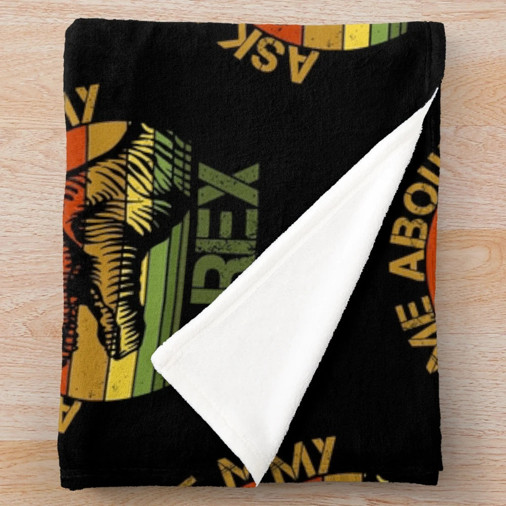 Plush blanket featuring a legendary T-Rex design for dinosaur enthusiasts
