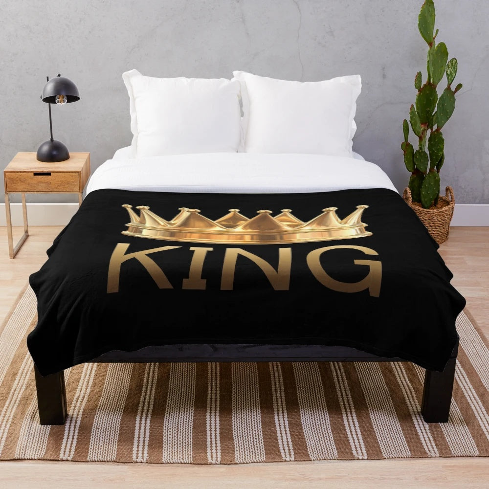 Plush black and gold crown blanket