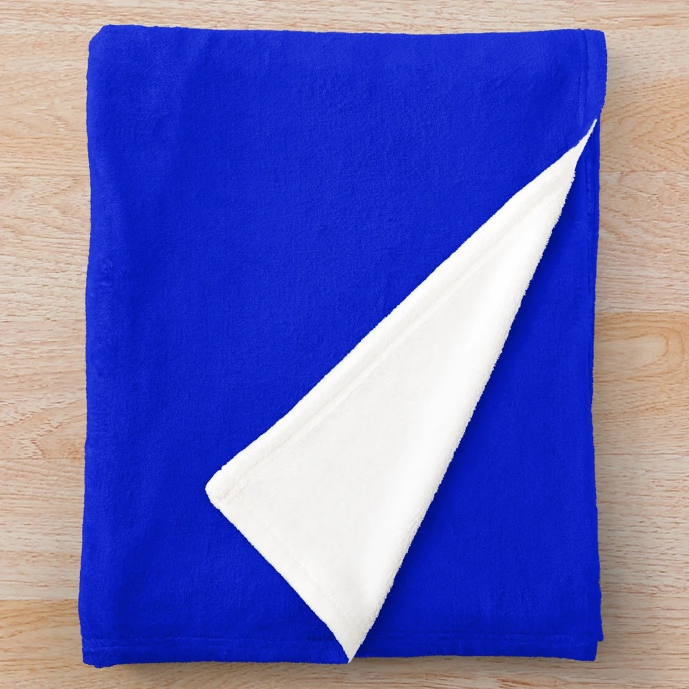 Cobalt blue plush blanket with a soft, vibrant hue