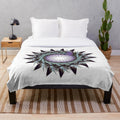 Luxurious designer plush blanket with a vibrant, trendy pattern
