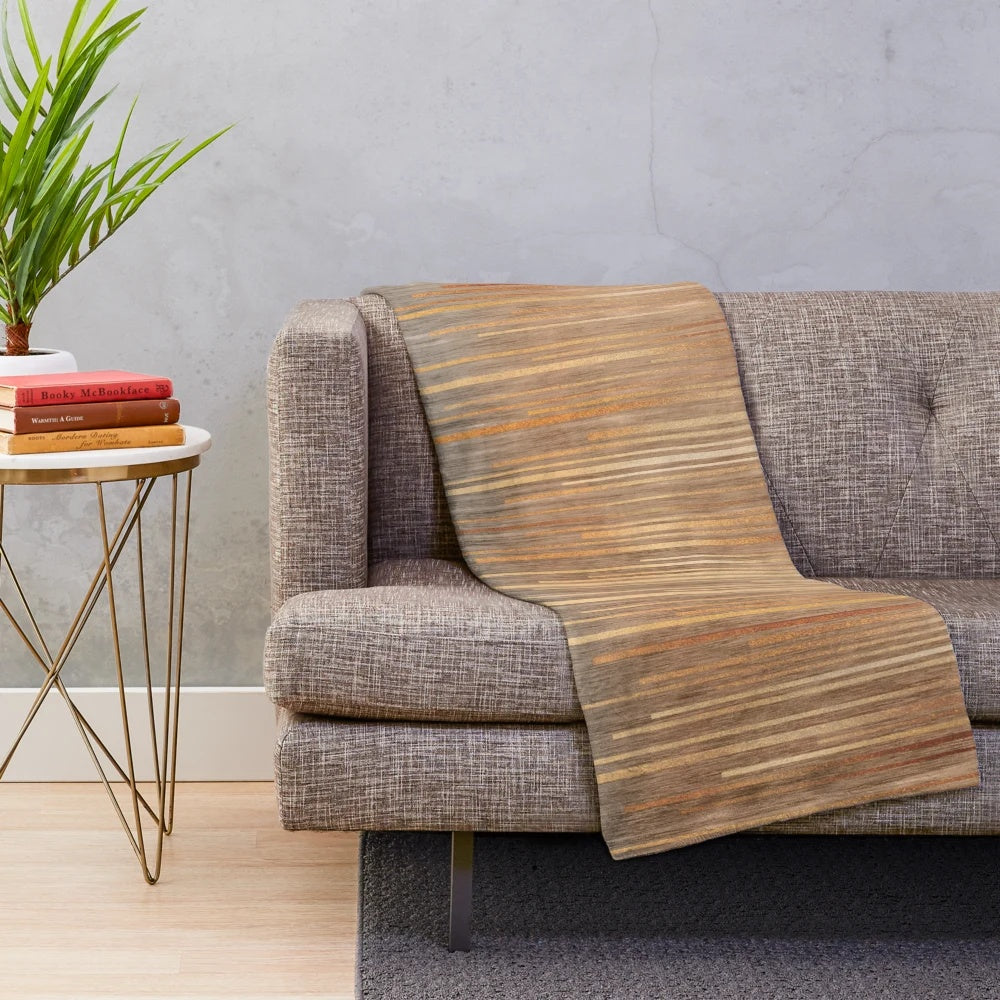 Gold and grey striped plush blanket
