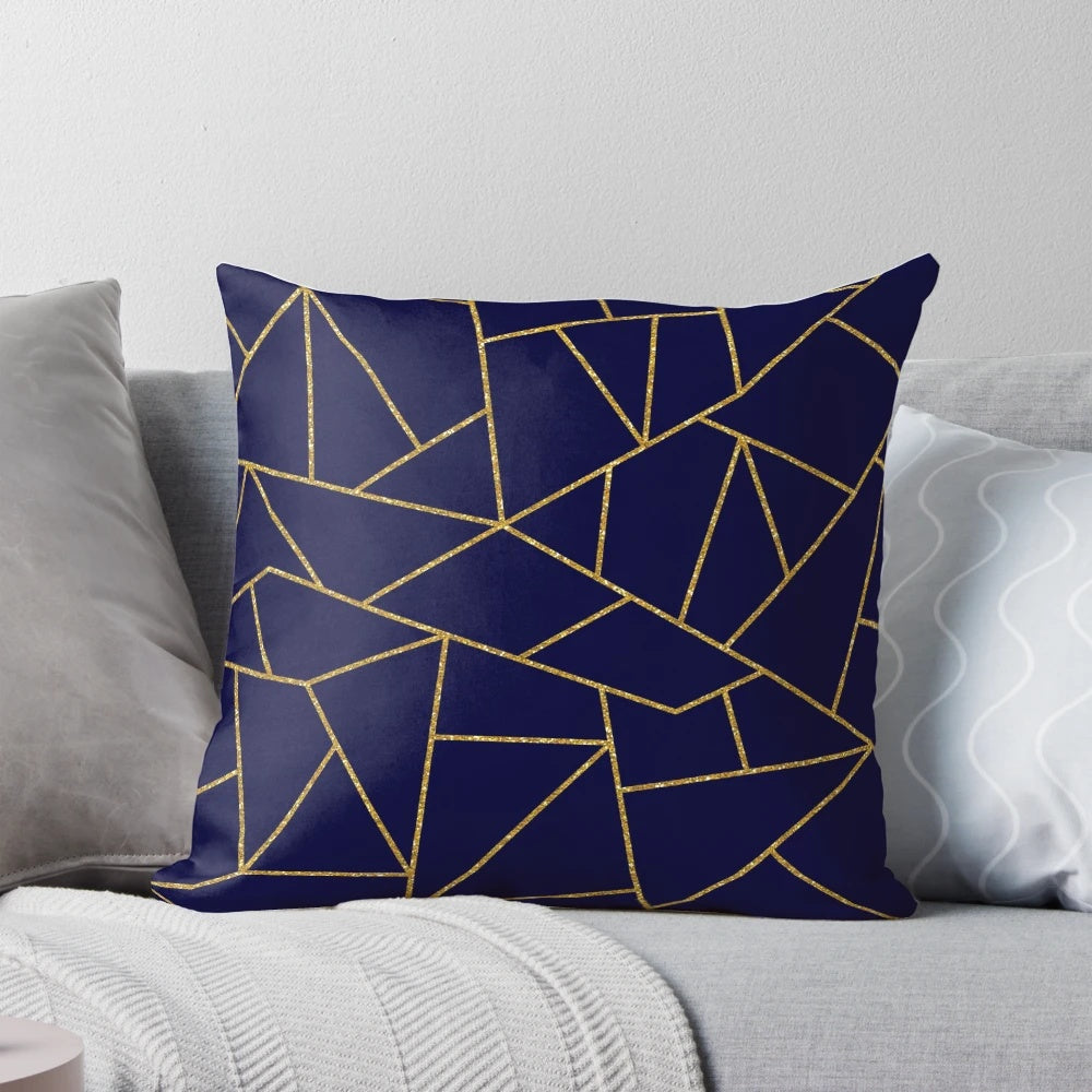 Navy blue throw pillow featuring a gold glitter abstract pattern design