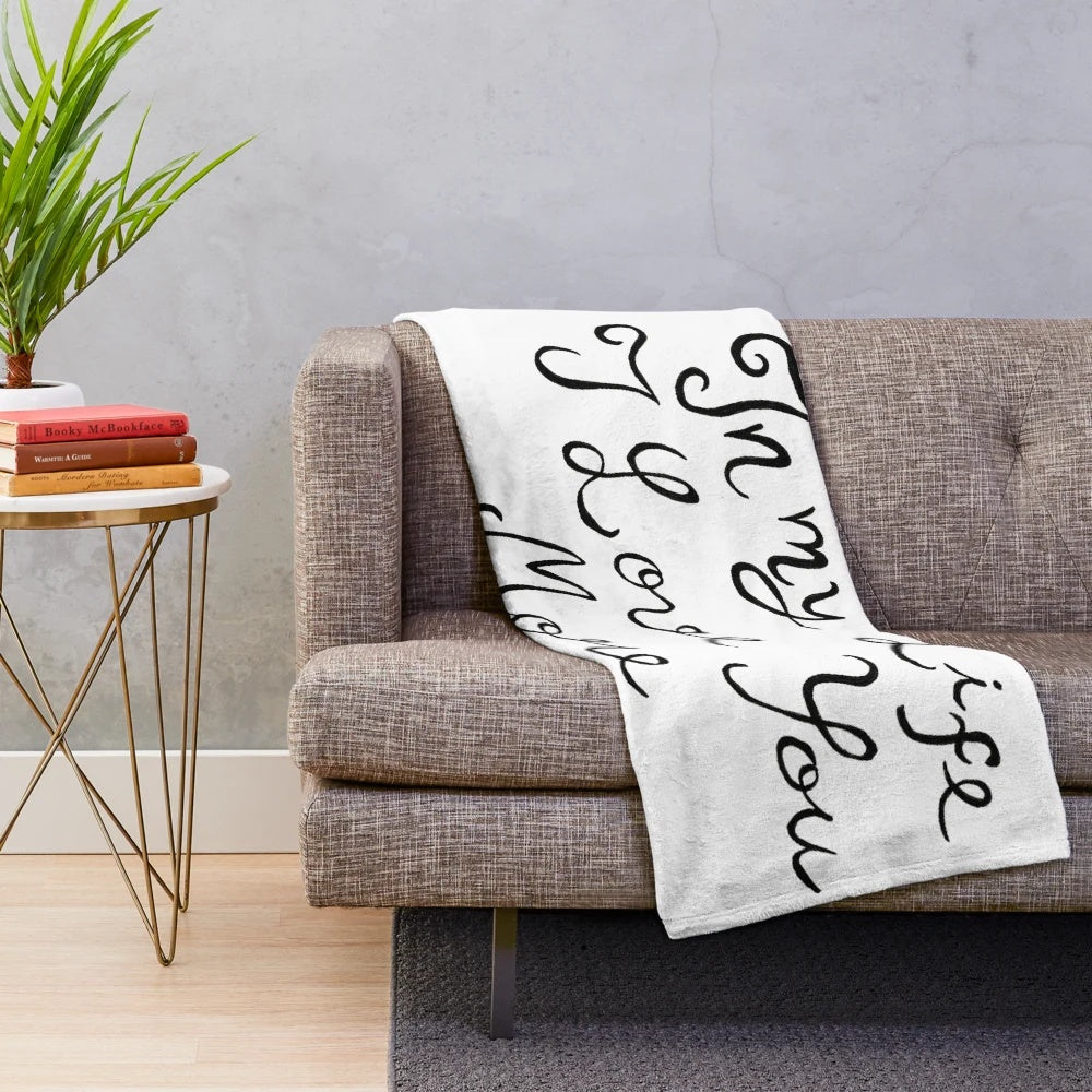 Plush blanket with lyrics from The Beatles' song "In My Life
