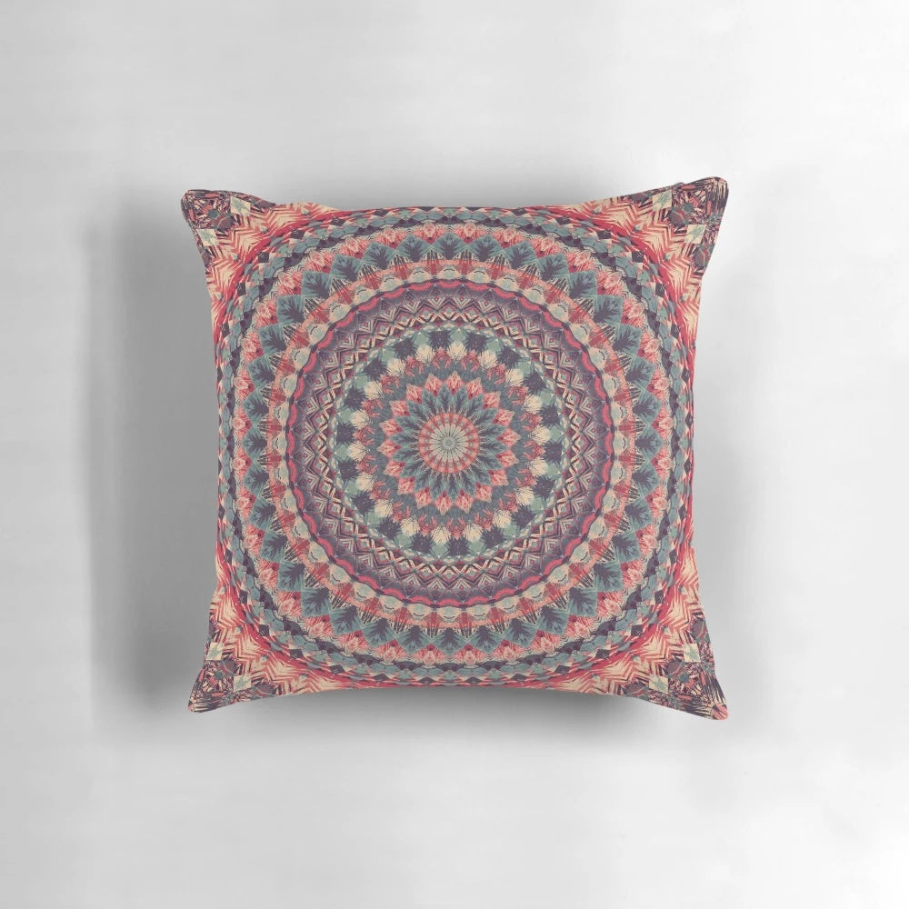 Colorful mandala pillow featuring sacred geometry and nature-inspired patterns