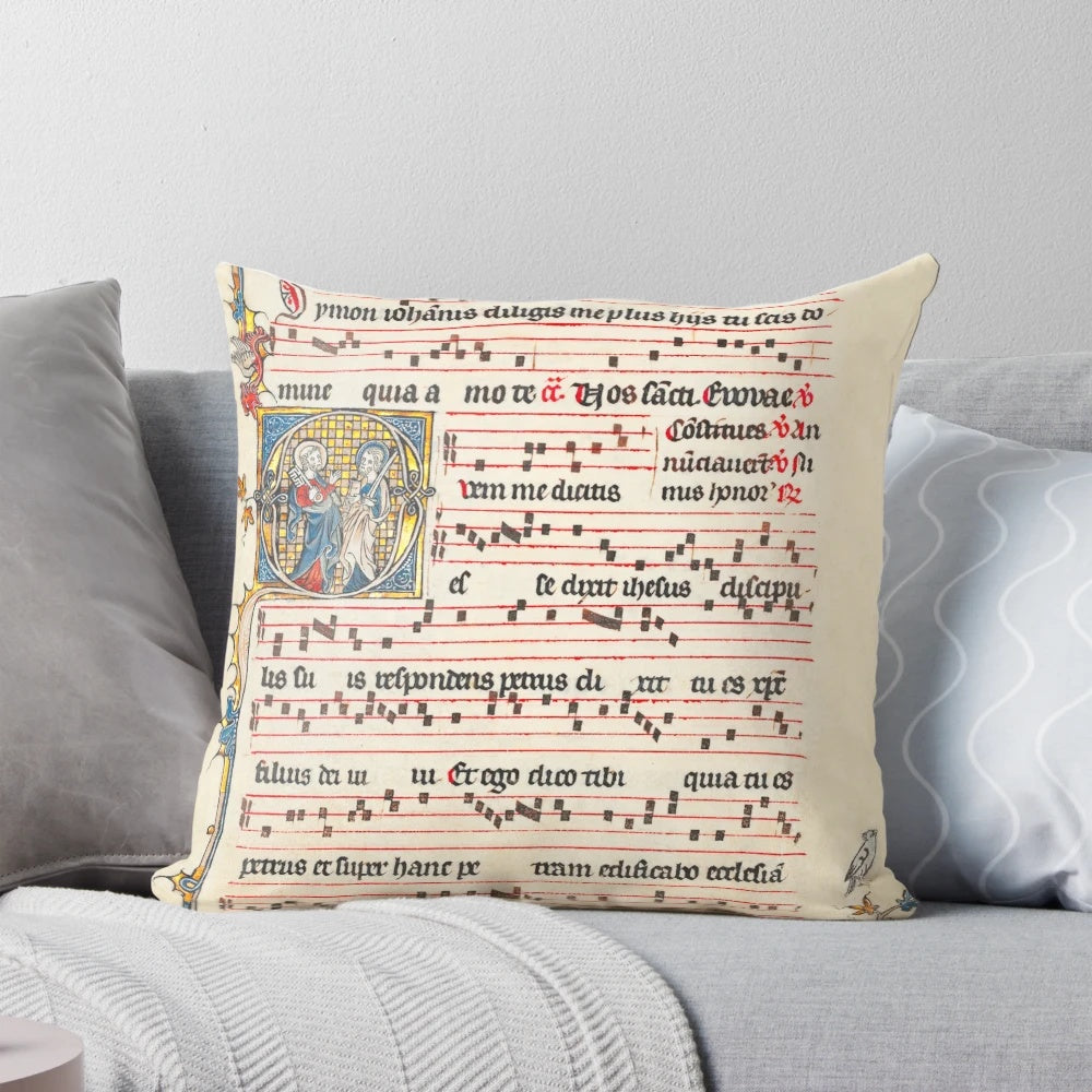 Decorative pillow featuring an image of a medieval antiphonary or musical manuscript used in Gregorian chant and Catholic liturgy.