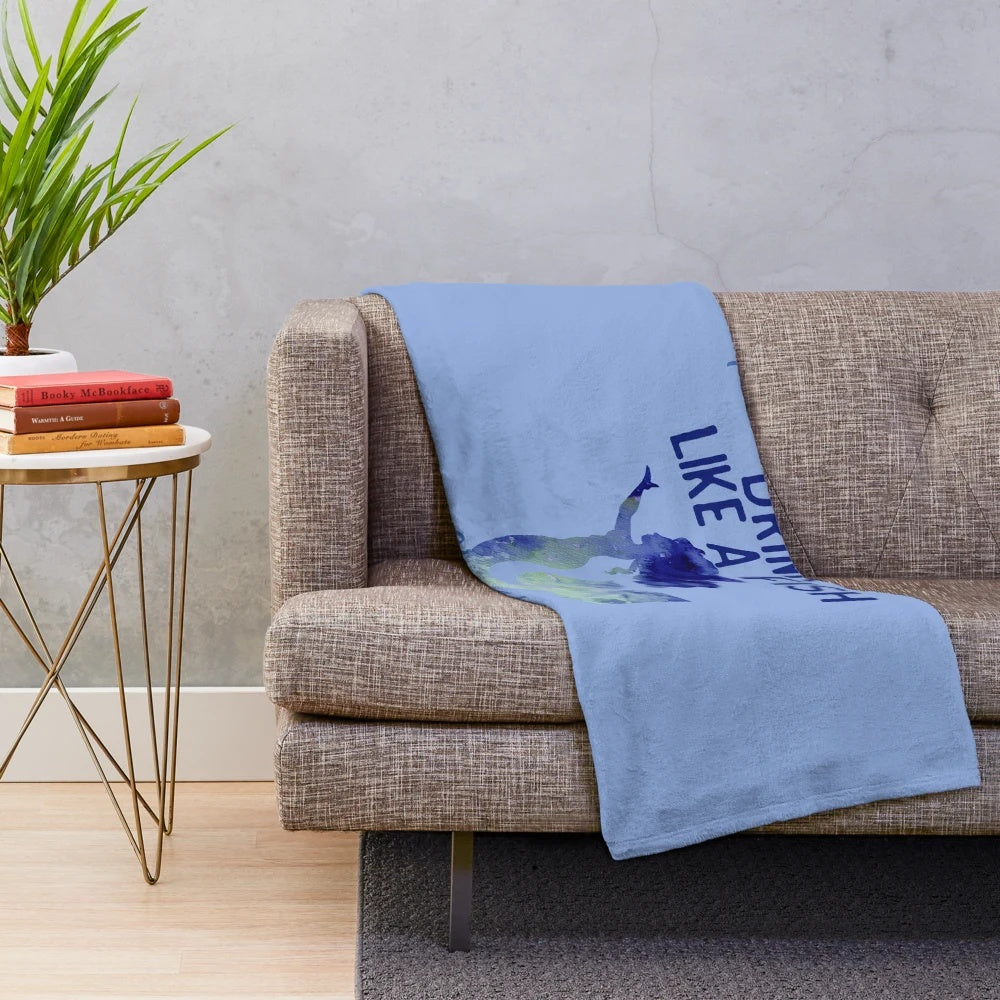 Mermaid plush blanket with a humorous "I drink like a fish" design