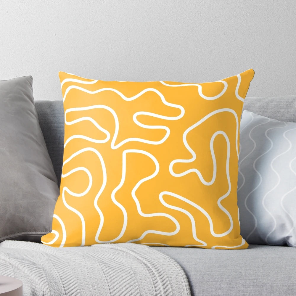 Minimalist abstract pattern pillow in a vibrant mustard yellow and white color scheme
