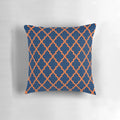 Decorative Moroccan-style pillow in orange and navy blue colors