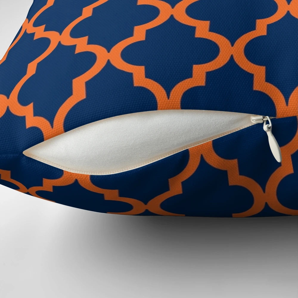 Decorative Moroccan-style pillow in orange and navy blue colors
