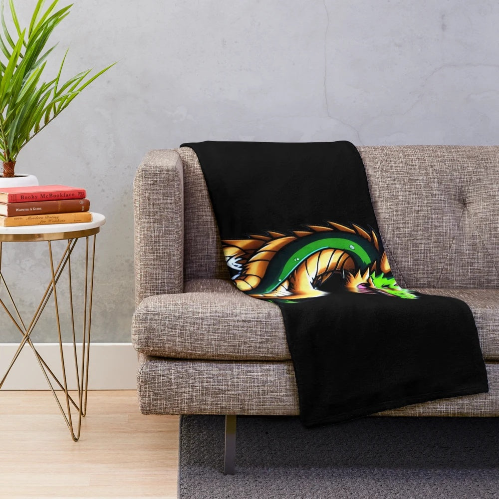 Anime-style illustration of a dragon on a plush blanket