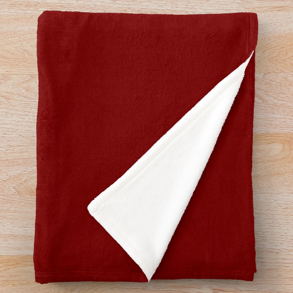 A plush, cozy blanket with a dragon design inspired by the BBC TV series Merlin
