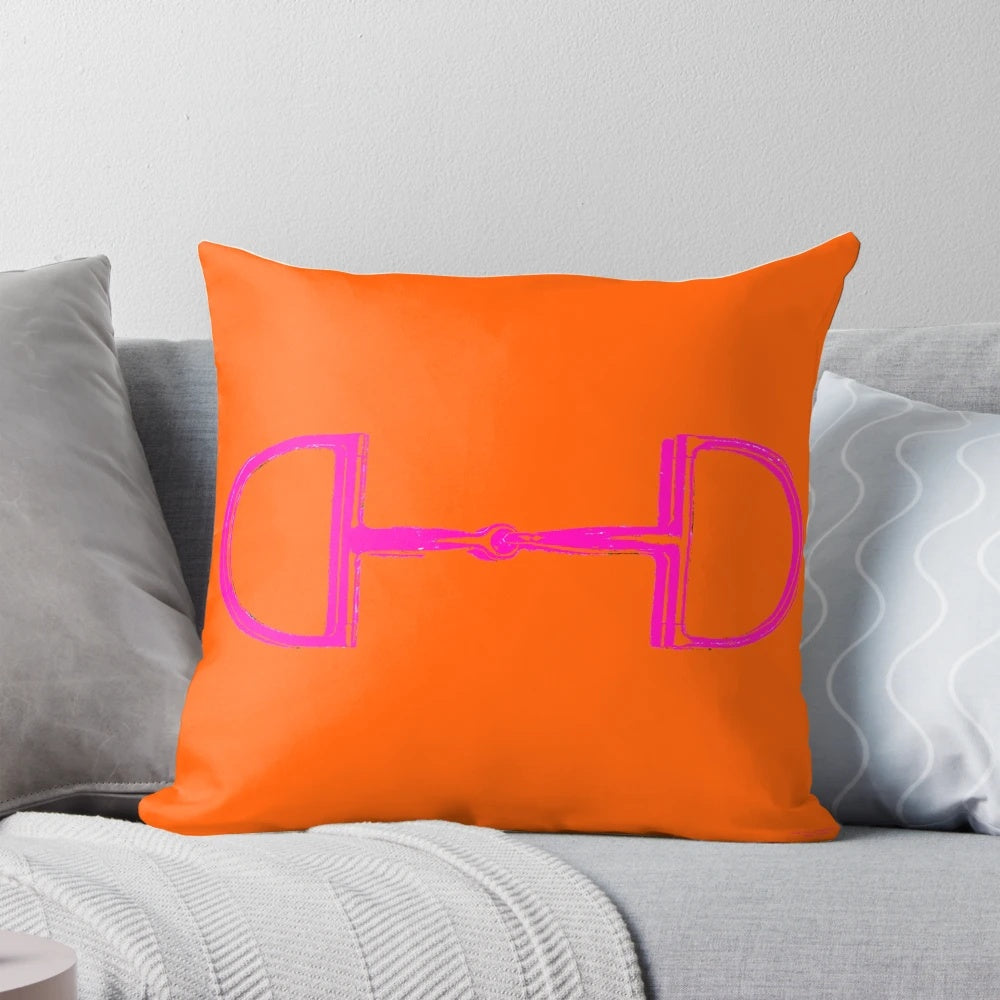 Neon orange and pink horse themed pillow with snaffle bit design