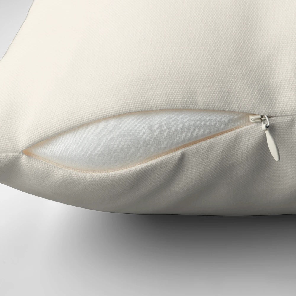 Nosey cow print pillow featuring a cheeky, large cow with horns in a herd design.