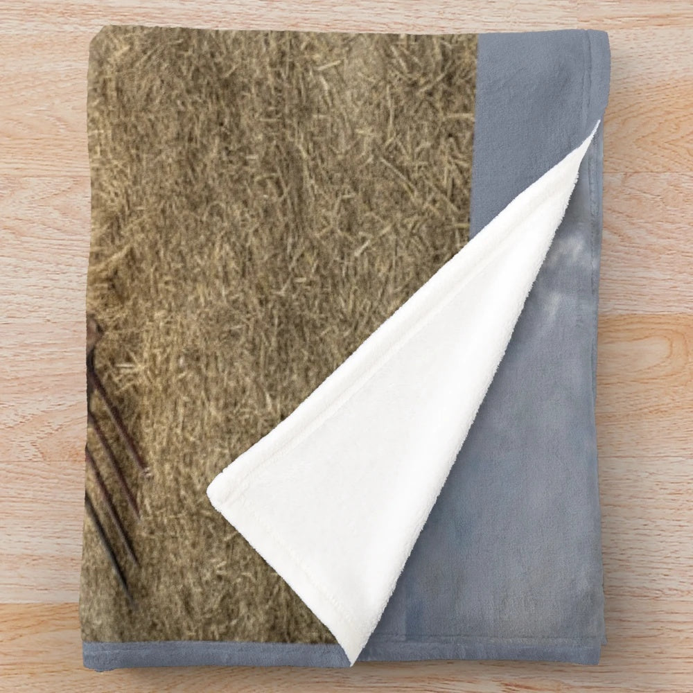 Soft, plush blanket featuring a vintage Leyland tractor design