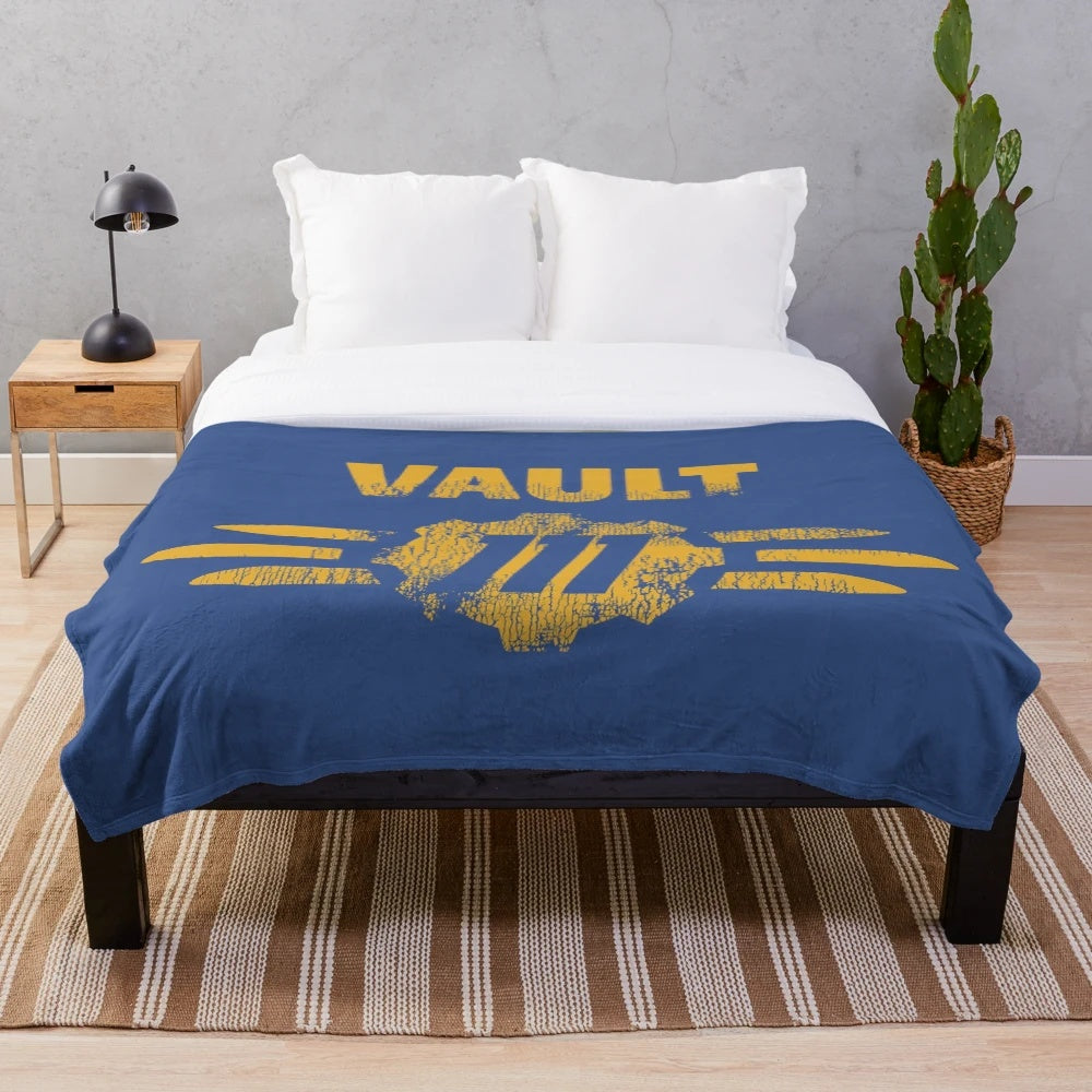 Fallout 111 plush blanket with worn vault logo design