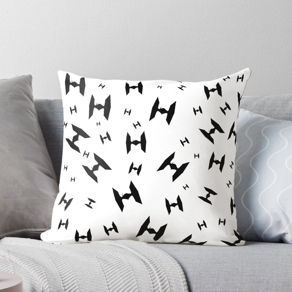 A decorative throw pillow featuring the iconic Tie Fighter spacecraft from the Star Wars universe.