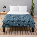 Orca patterned plush blanket with a soft, cozy killer whale design