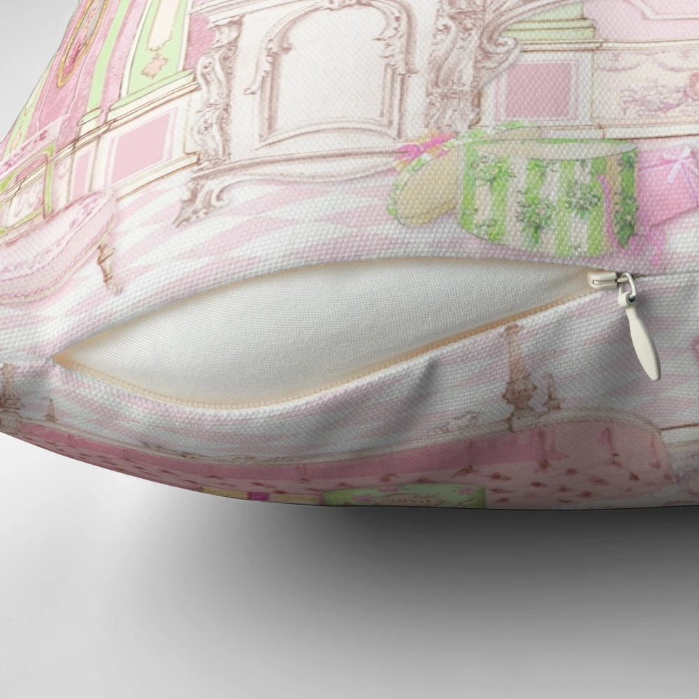 Soft pink pillow with a watercolor illustration of a French patisserie and diorama scene, featuring a Marie Antoinette-inspired cake shop.
