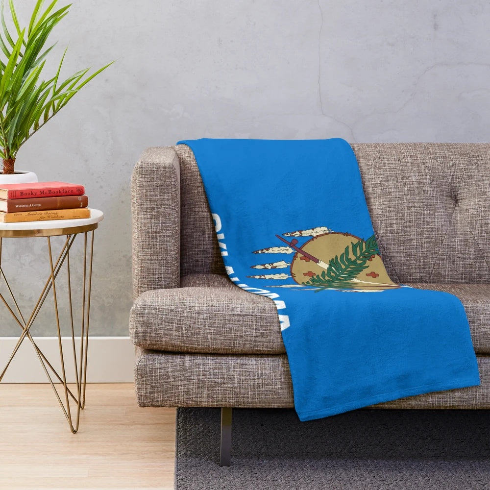 Plush blanket featuring the Oklahoma state flag design