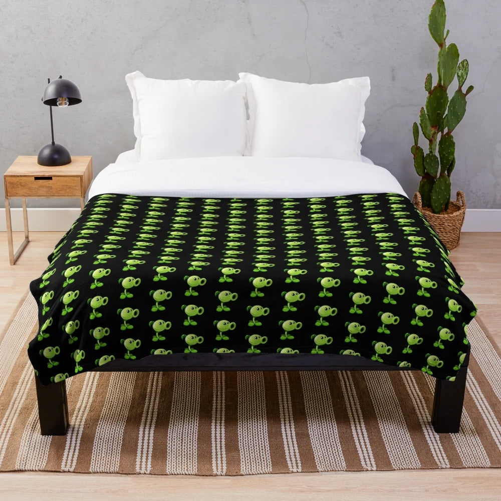 Pea plant plush blanket featuring a black background