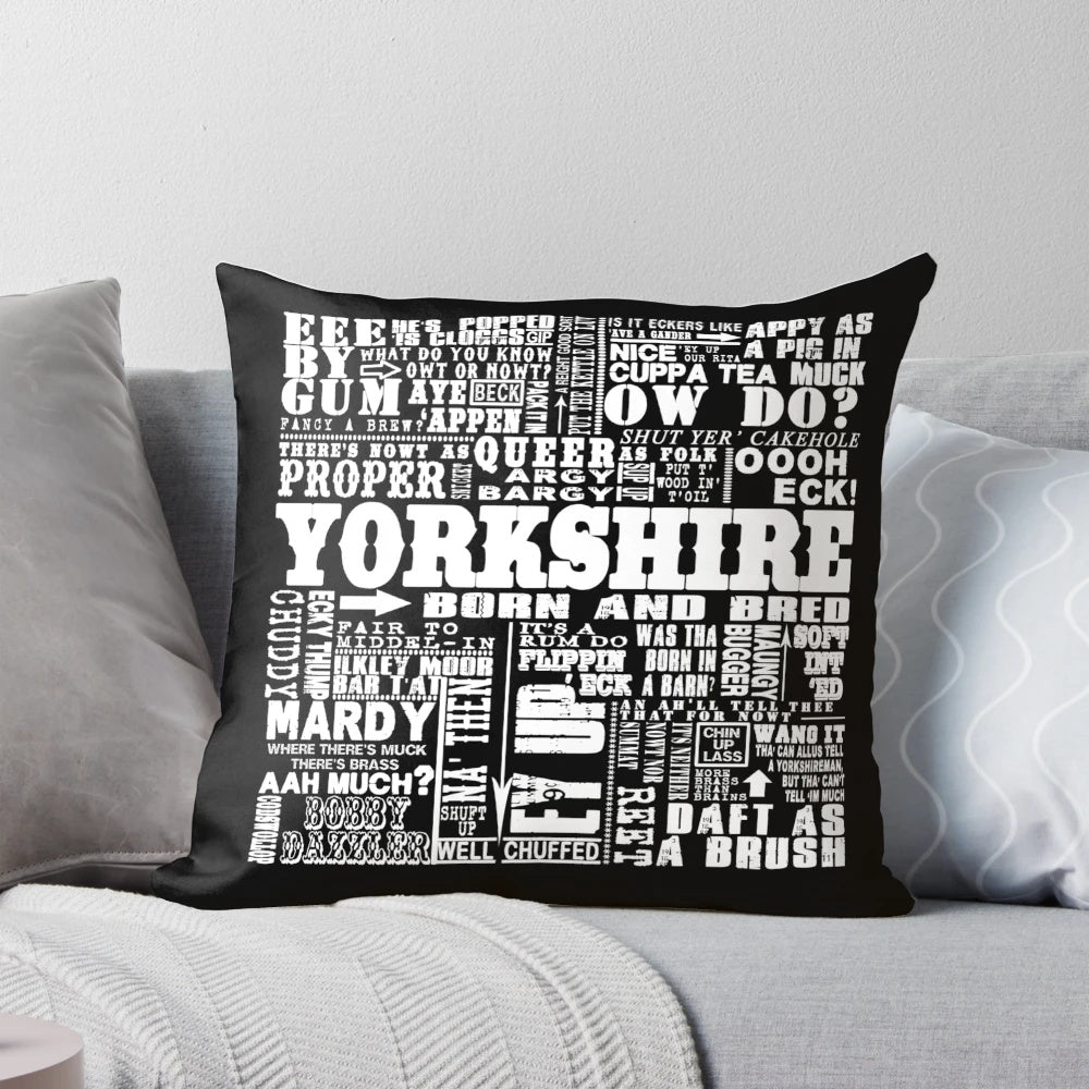 Vintage-style YORKSHIRE SAYINGS text on a decorative pillow
