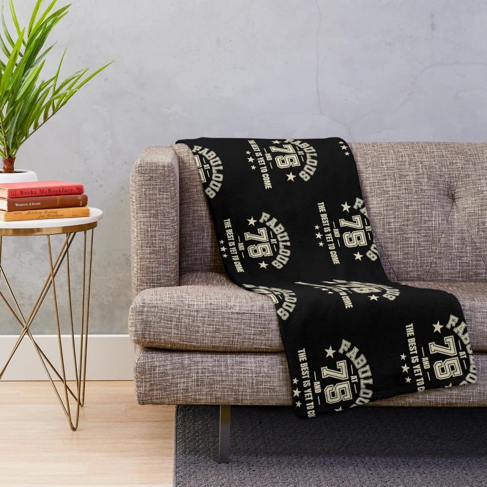 Plush blanket with "Fabulous at 75" and "The Best is Yet to Come" design for 75th birthday
