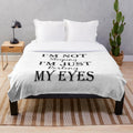 Plush blanket with the text "I'm Not Sleeping, I'm Just Resting My Eyes