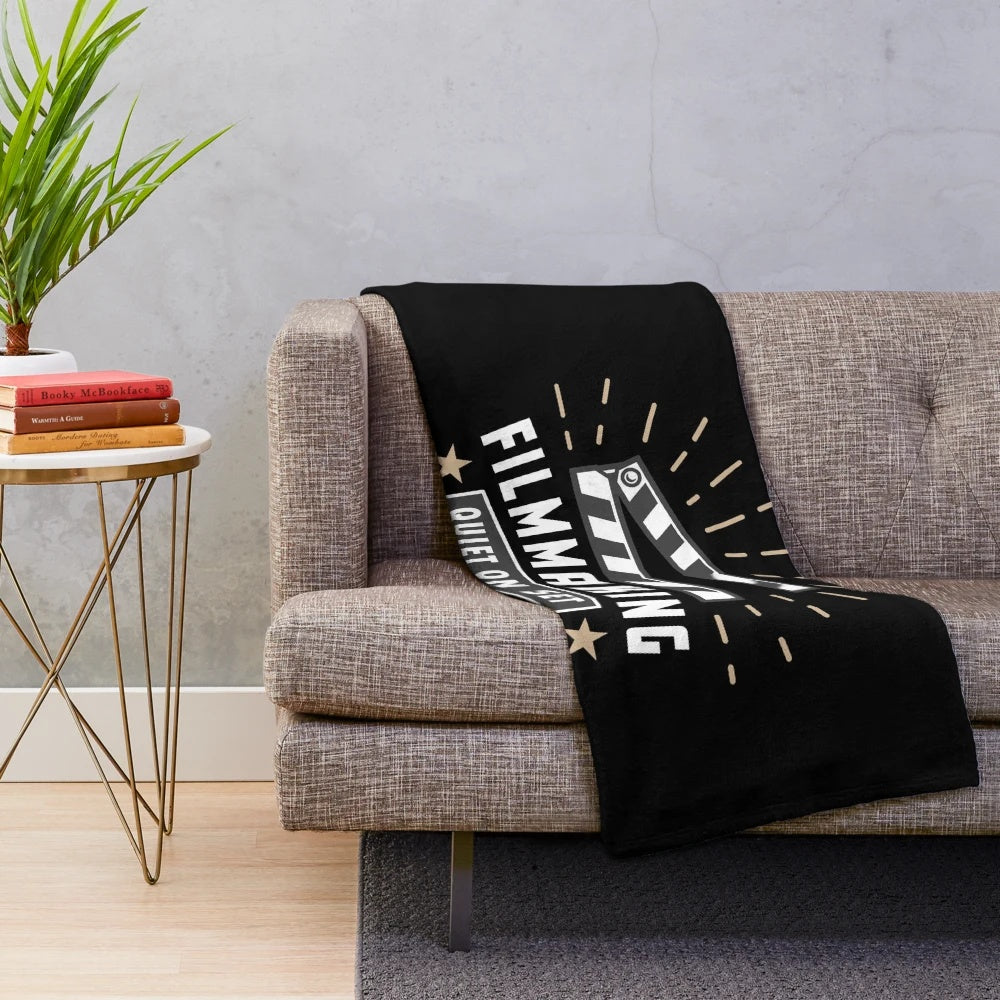Plush blanket featuring filmmaking and cinema-themed graphic