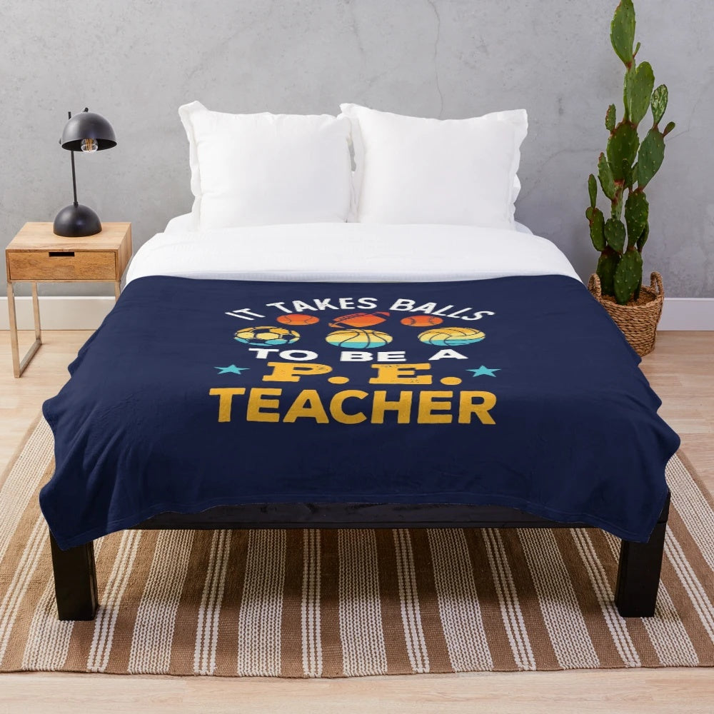 Plush blanket featuring a funny "It Takes Balls to Be a PE Teacher" design for physical education teachers and coaches