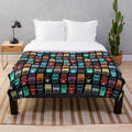 Plush blanket with guitar pedal design
