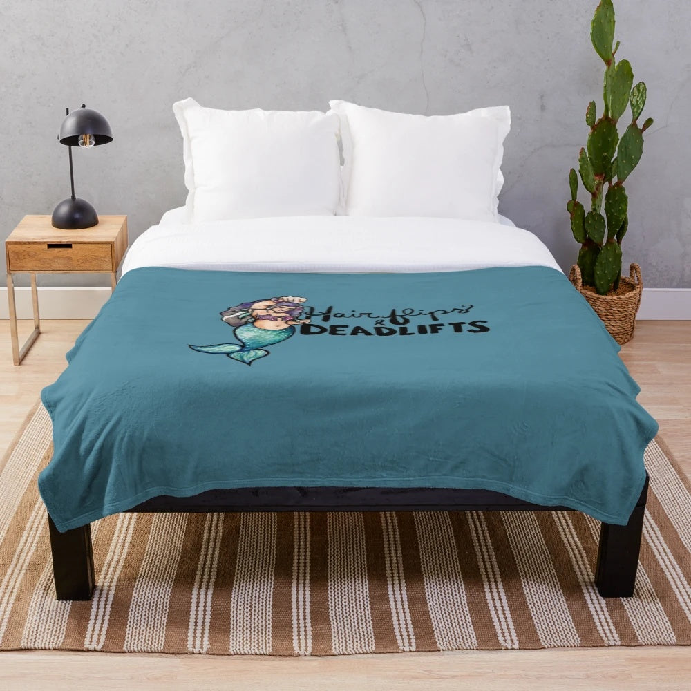 Plush blanket featuring hair flips and deadlifts design