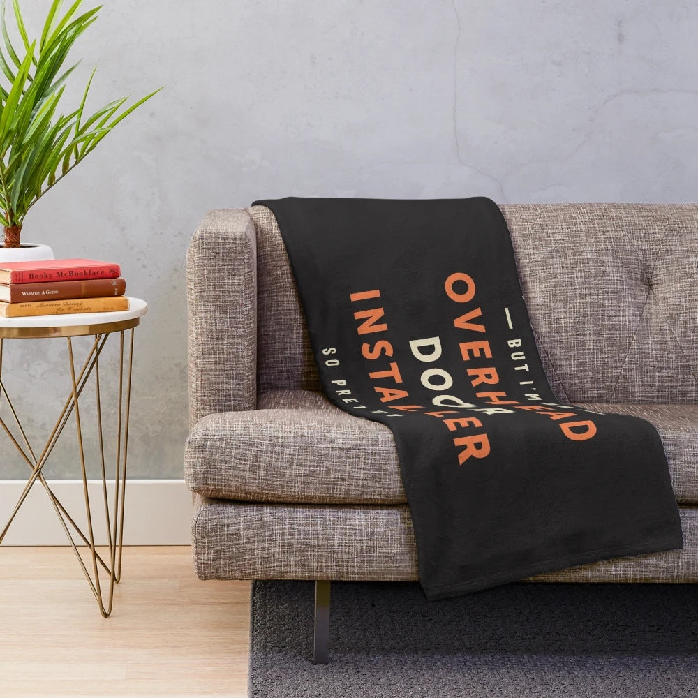 Plush blanket featuring an overhead door installer design