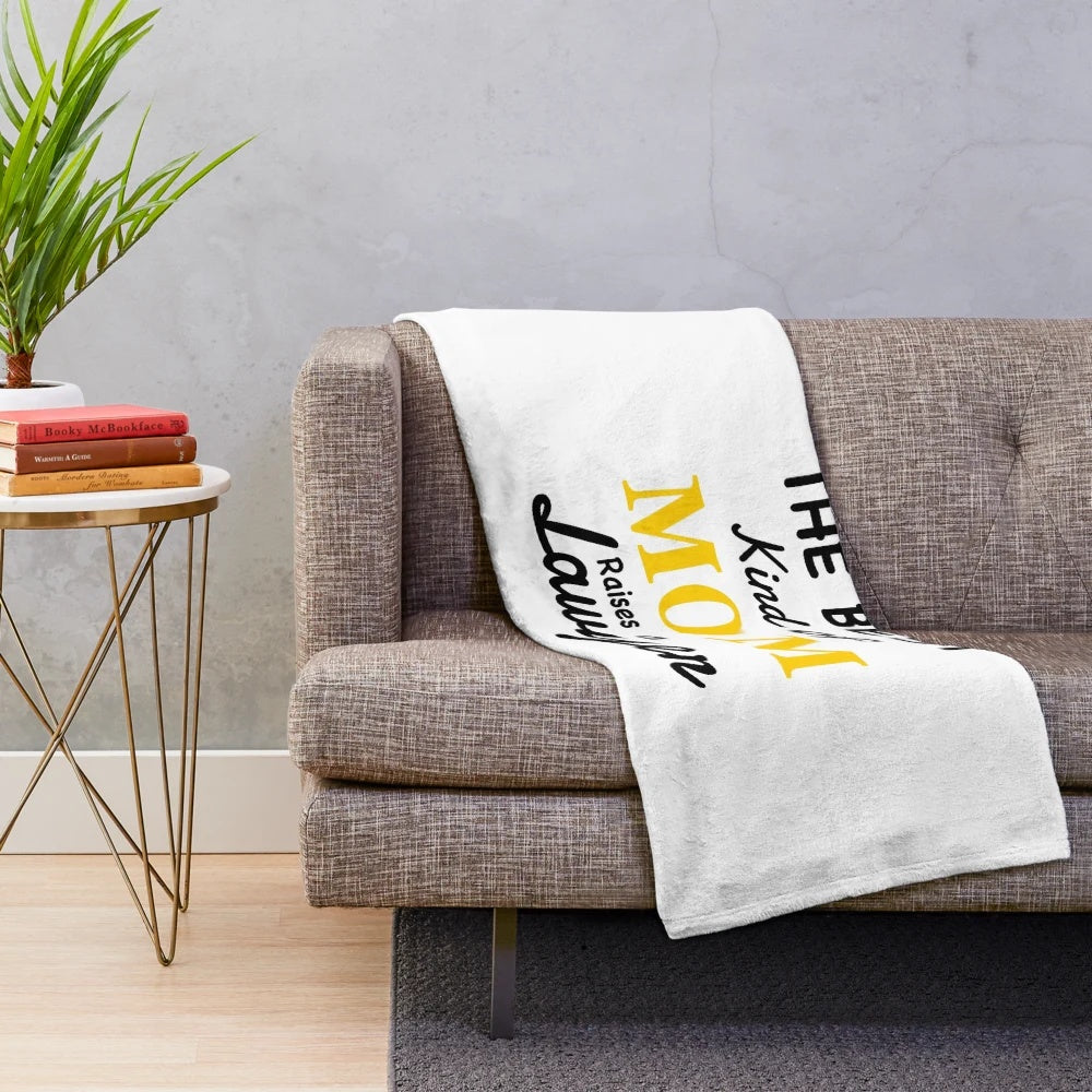 Plush blanket featuring the text "The Best Kind of Mom Raises a Lawyer