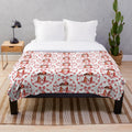 Plush blanket with Chinese-inspired sacred patterns