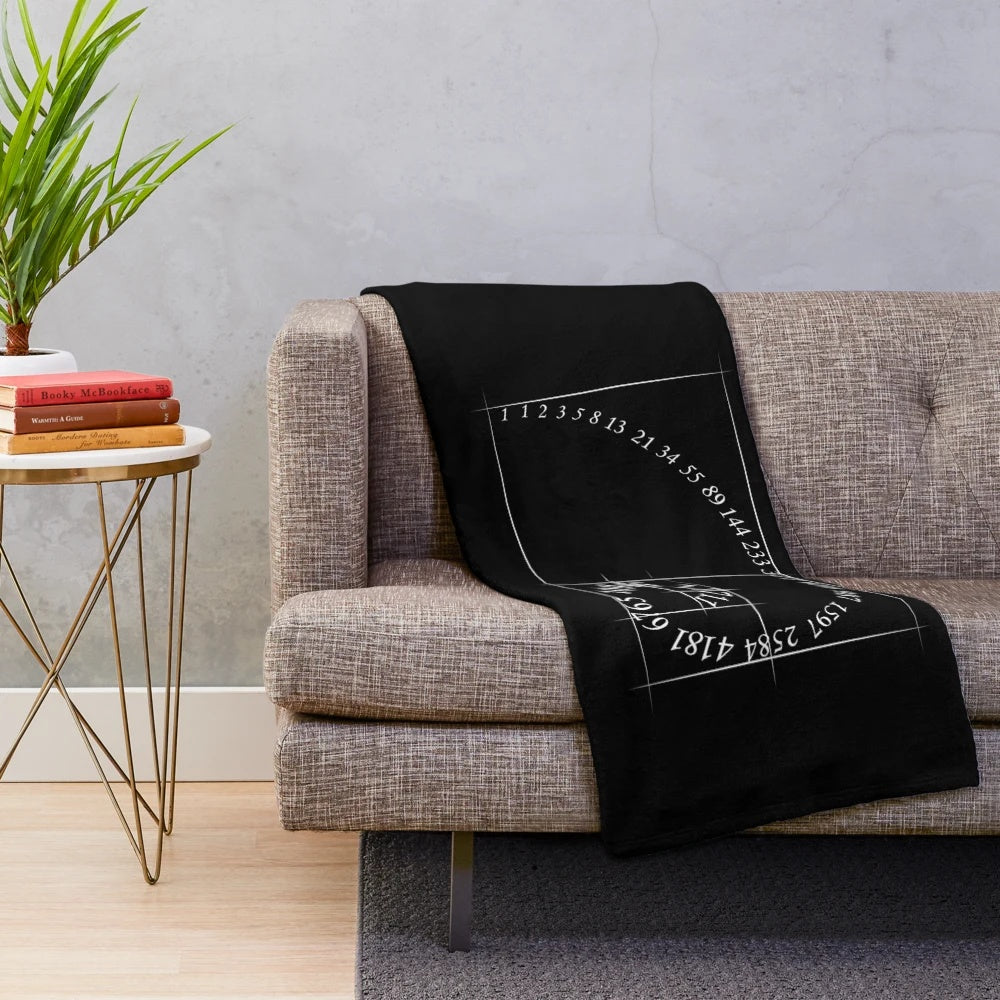 Plush blanket featuring a fibonacci golden ratio spiral design for math and geometry lovers