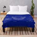Plush blanket featuring a vintage blueprint-style design of Dodger Stadium with a white stencil on a blue galaxy backdrop