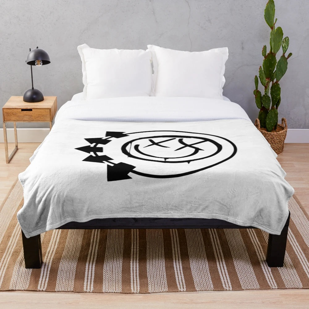Blink 182 inspired plush blanket with the band's name and imagery