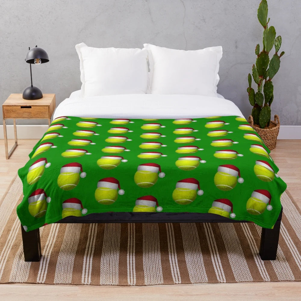 Soft and cozy plush tennis ball-themed Christmas blanket for sports fans