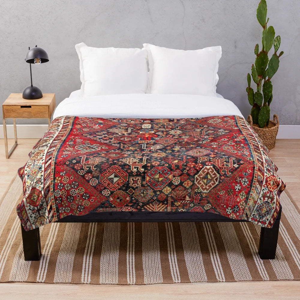 Qashqai-inspired plush blanket with ethnic geometric rug print