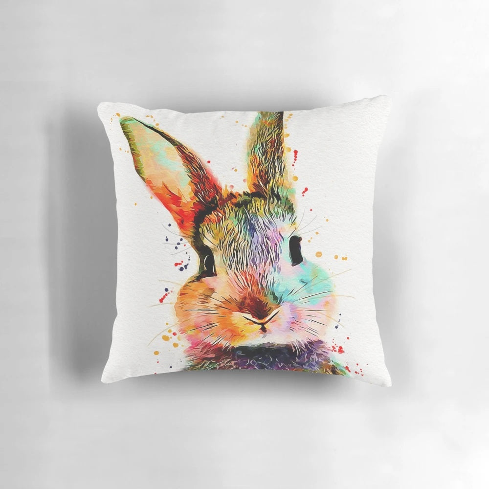 Rabbit watercolor painting on a cozy throw pillow, perfect for a nursery or bedroom.