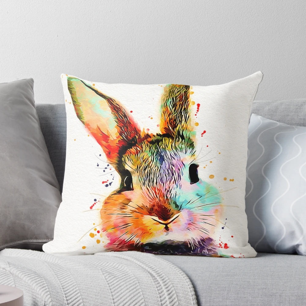 Rabbit watercolor painting on a cozy throw pillow, perfect for a nursery or bedroom.