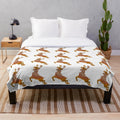 Reindeer plush blanket with abstract, colorful design