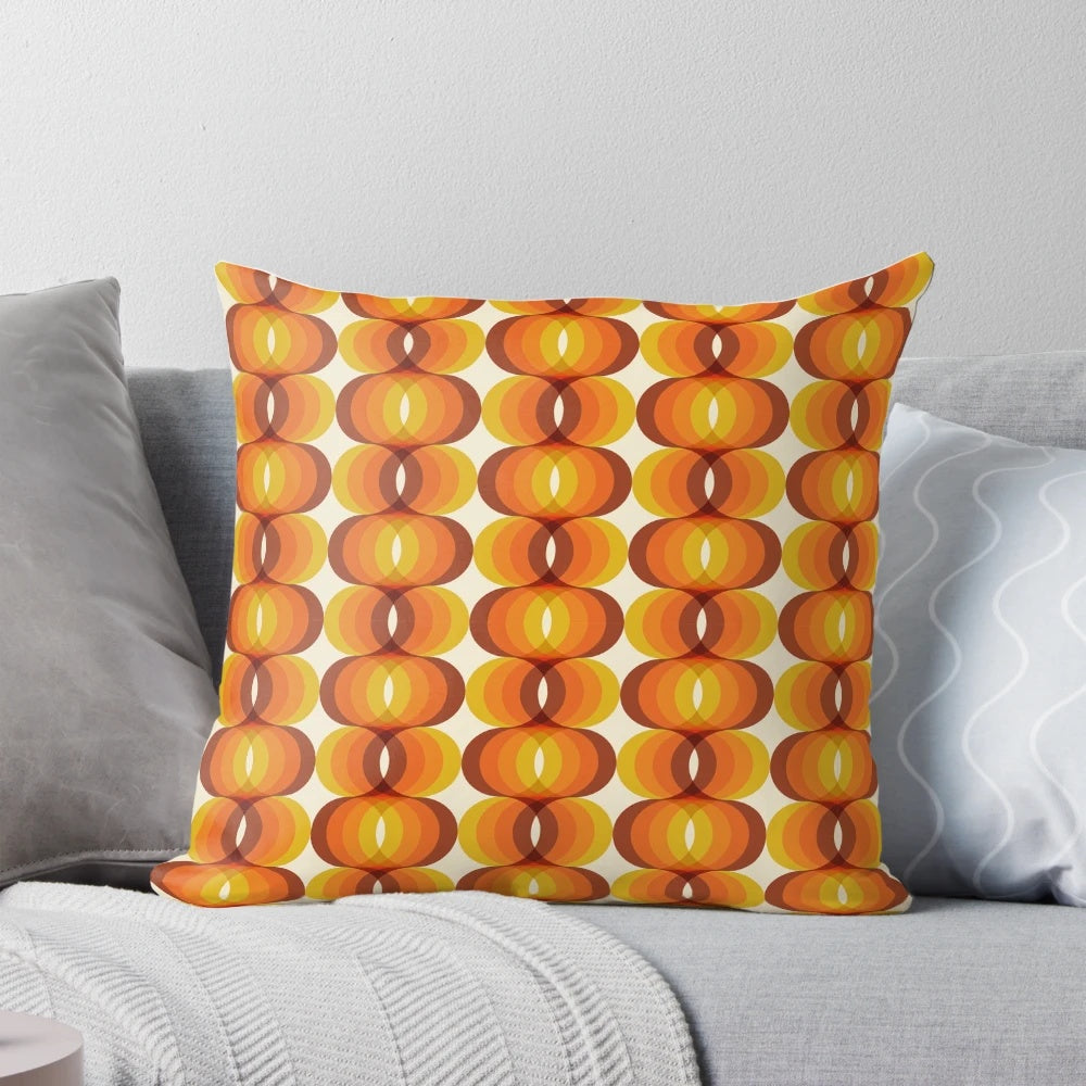 Retro 1960s wavy geometric pattern throw pillow in brown, orange, and ivory colors